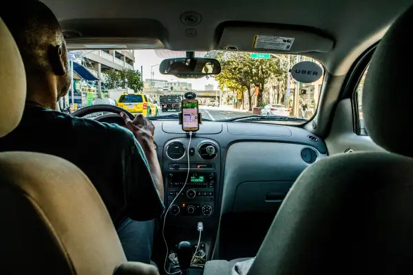 An Uber driver in the early-morning rush in the financial district of San Francisco.