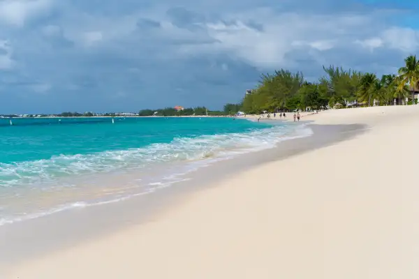 View Of Beach Against Cloudy Sky