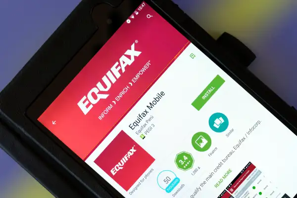 Equifax consumer credit reporting agency app shown on a tablet computer, Dorset, England, UK