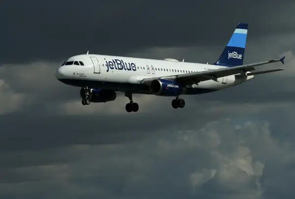 A JetBlue aircraft comes in to land at Long Beach Airport in Long Beach