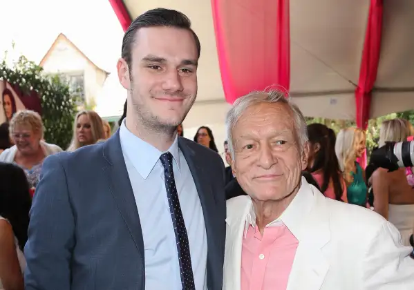 Playboy Founder Hugh Hefner and and his son Cooper Hefner attend Playmate of the Year at the Mansion