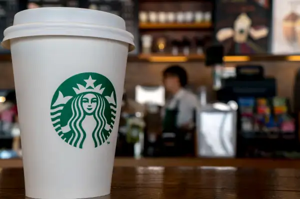 Paper cup in a Starbucks coffee shop.  During the third