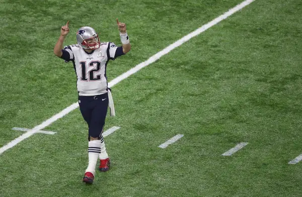 Tom Brady on a football field