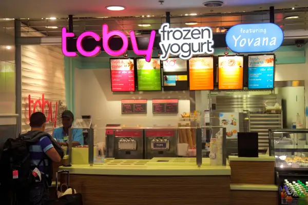 Charlotte North Carolina Charlotte Douglas International Airport CLT terminal concourse gate area TCBY Frozen Yogurt counter des