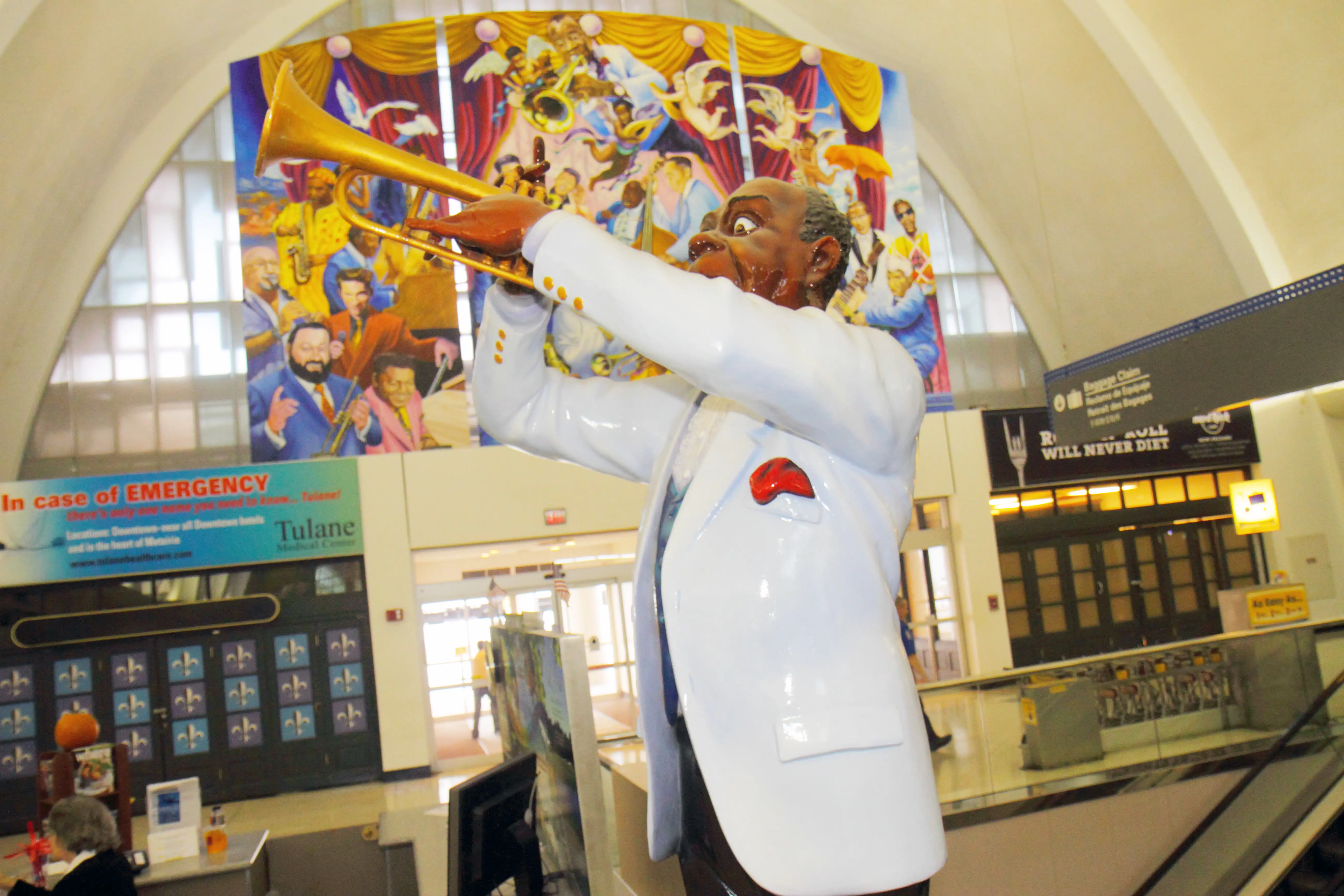 New Orleans Louisiana Louis Armstrong New Orleans International Airport MSY terminal sculpture Louis Armstrong Satchmo jazz trum