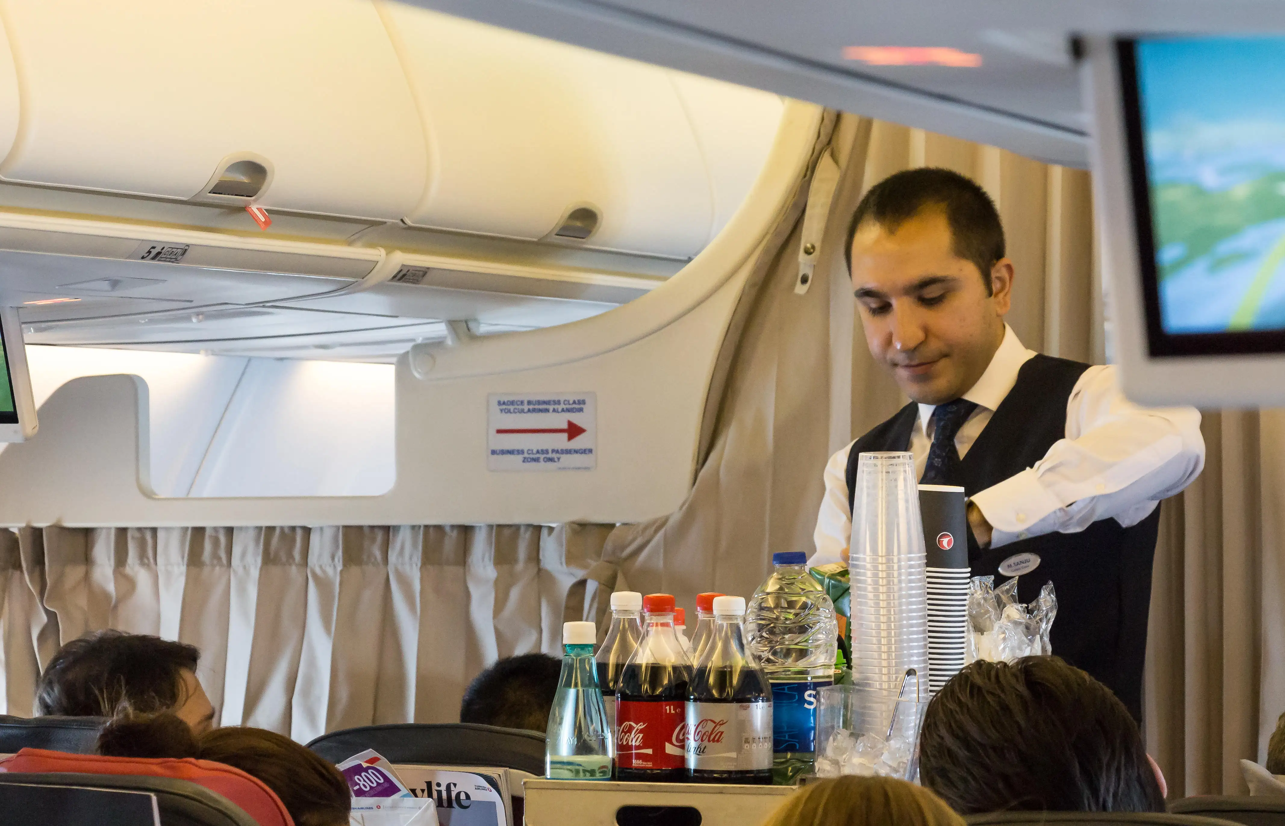 Flight attendant serving breakfast onboard a Boeing 737, Turkish Airlines. Tokyo, Japan, April 8, 2017.