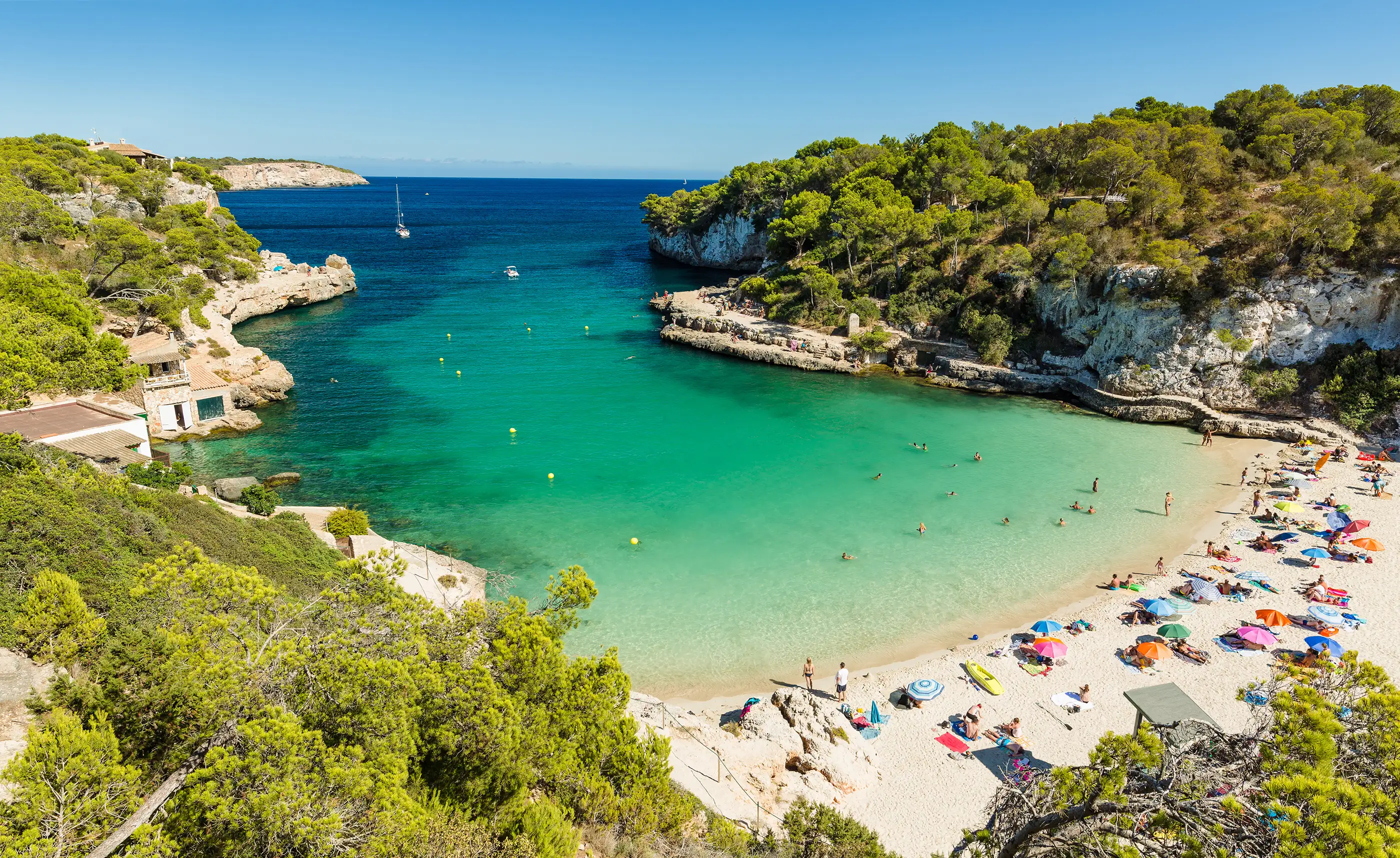 Cala Llombards. Beautiful sandy beach that is sheltered on either side by cliffs. Mallorca island, Spain.