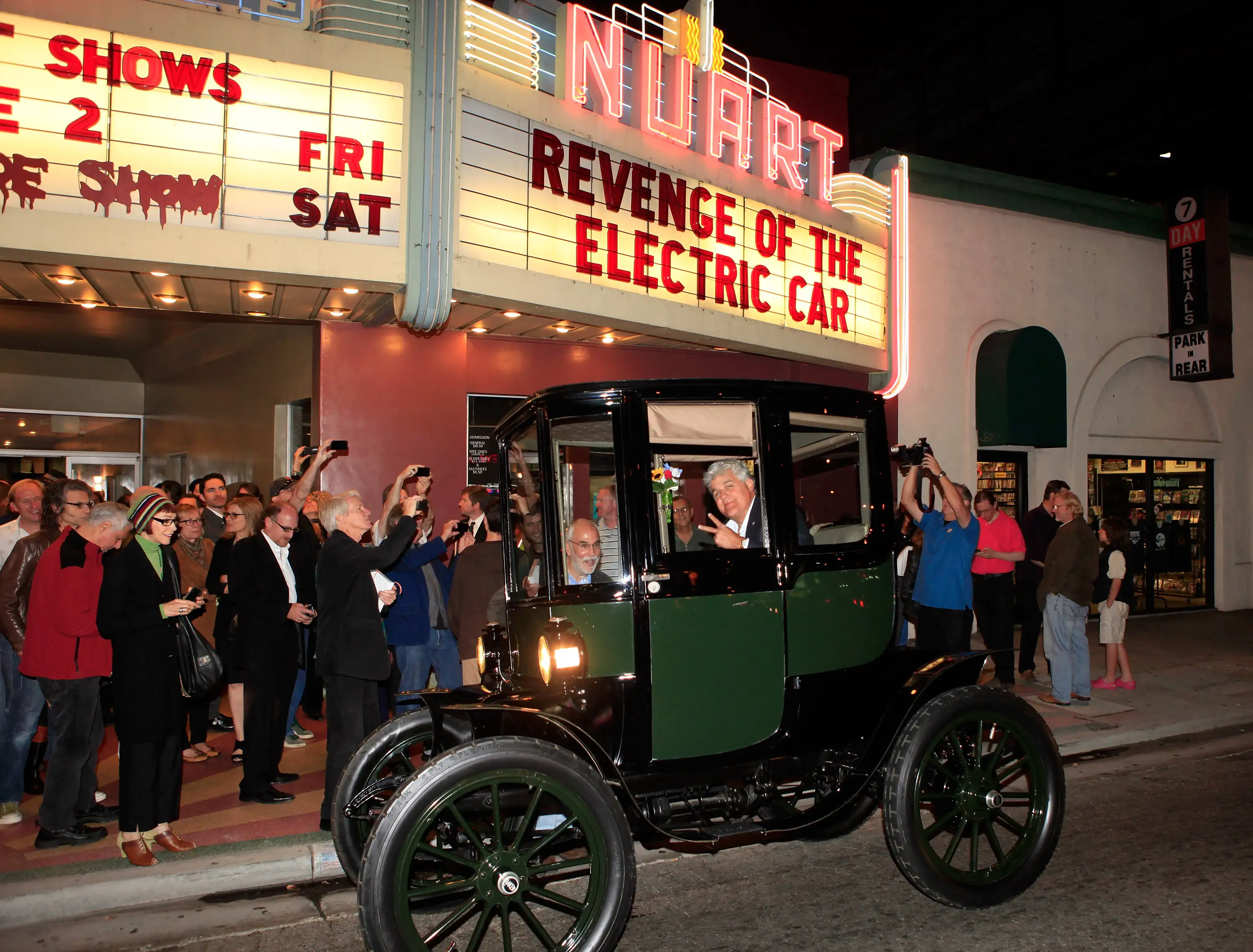 Jay Leno arrives in his 1909 Baker Electric car at &quot;Revenge Of The Electric Car&quot; Premiere held at Landmark Nuart Theatre on October 21, 2011 in Los Angeles, California.