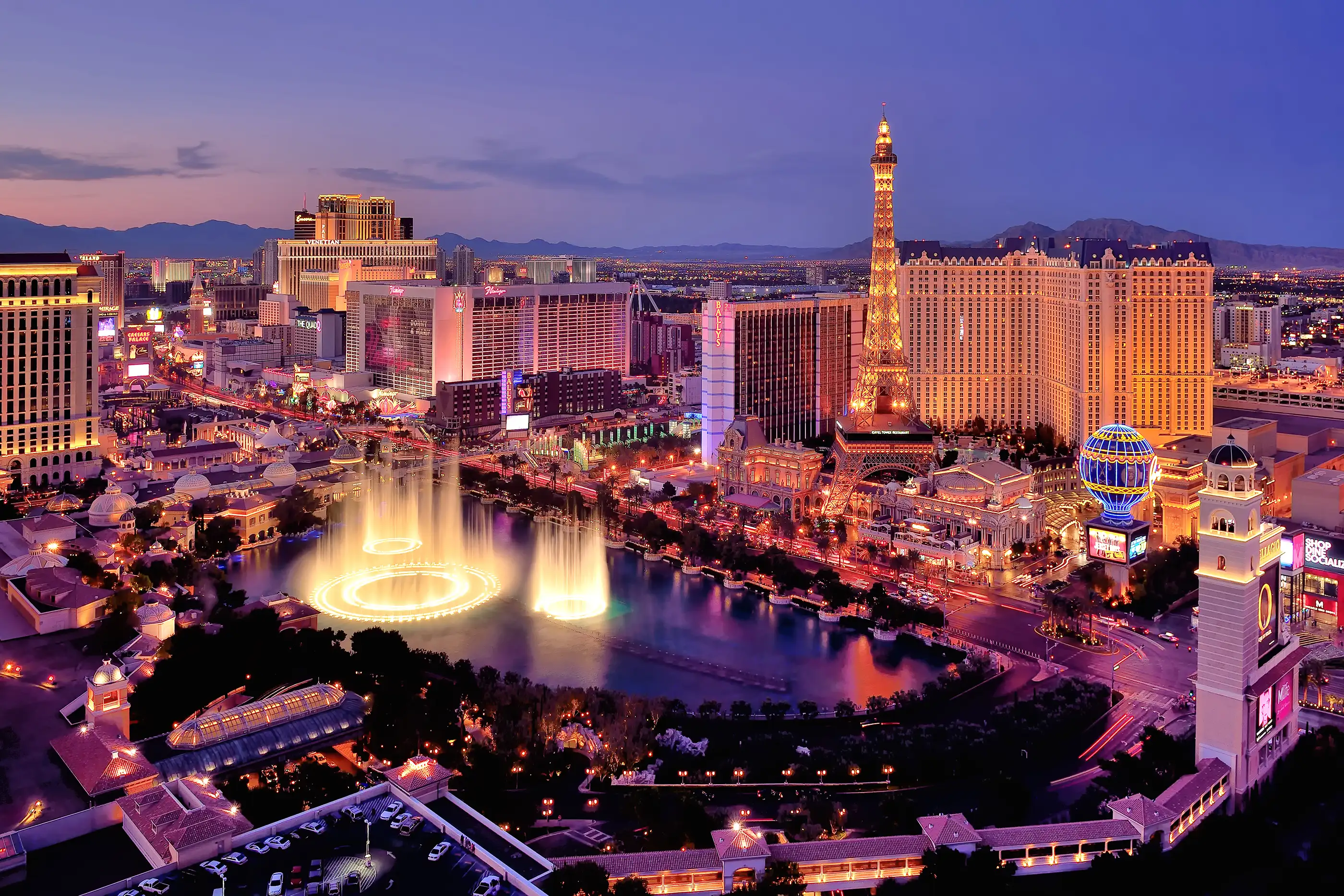 City skyline at night with Bellagio Hotel water fountains, Las Vegas, Nevada, America, USA