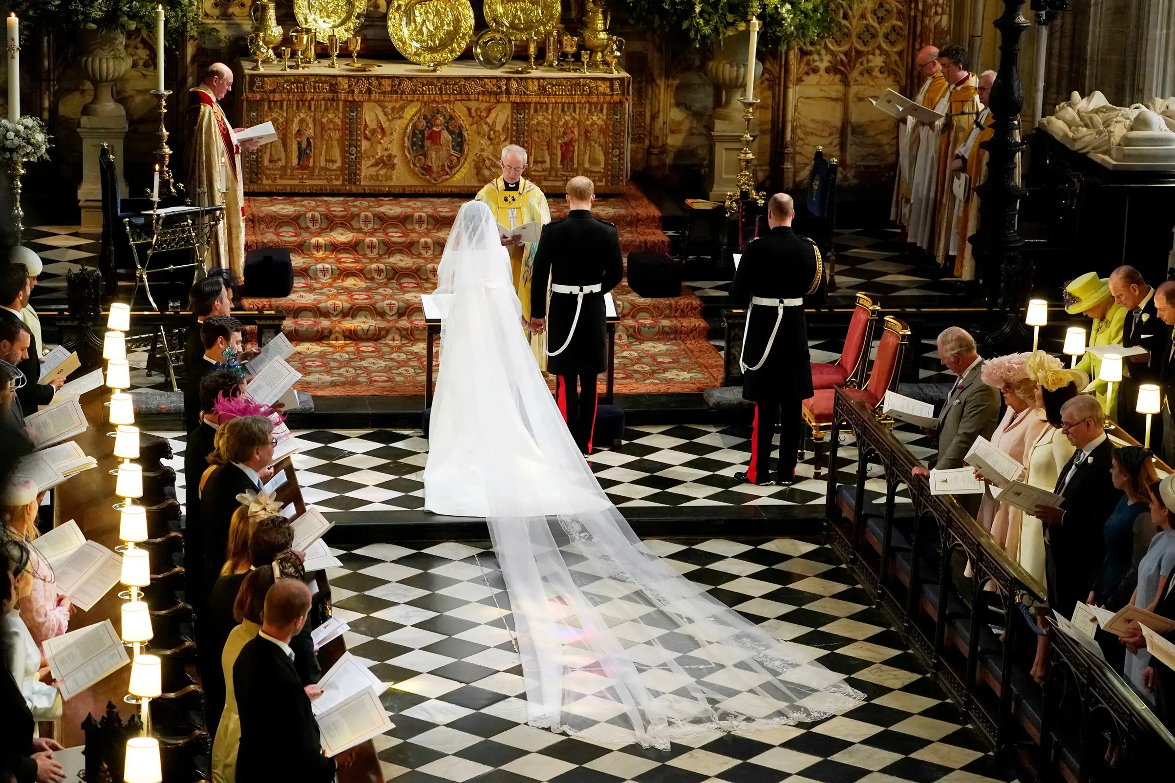 Prince Harry and Meghan Markle in St George's Chapel at Windsor Castle during their wedding service, conducted by the Archbishop of Canterbury Justin Welby in Windsor, Britain, May 19, 2018.