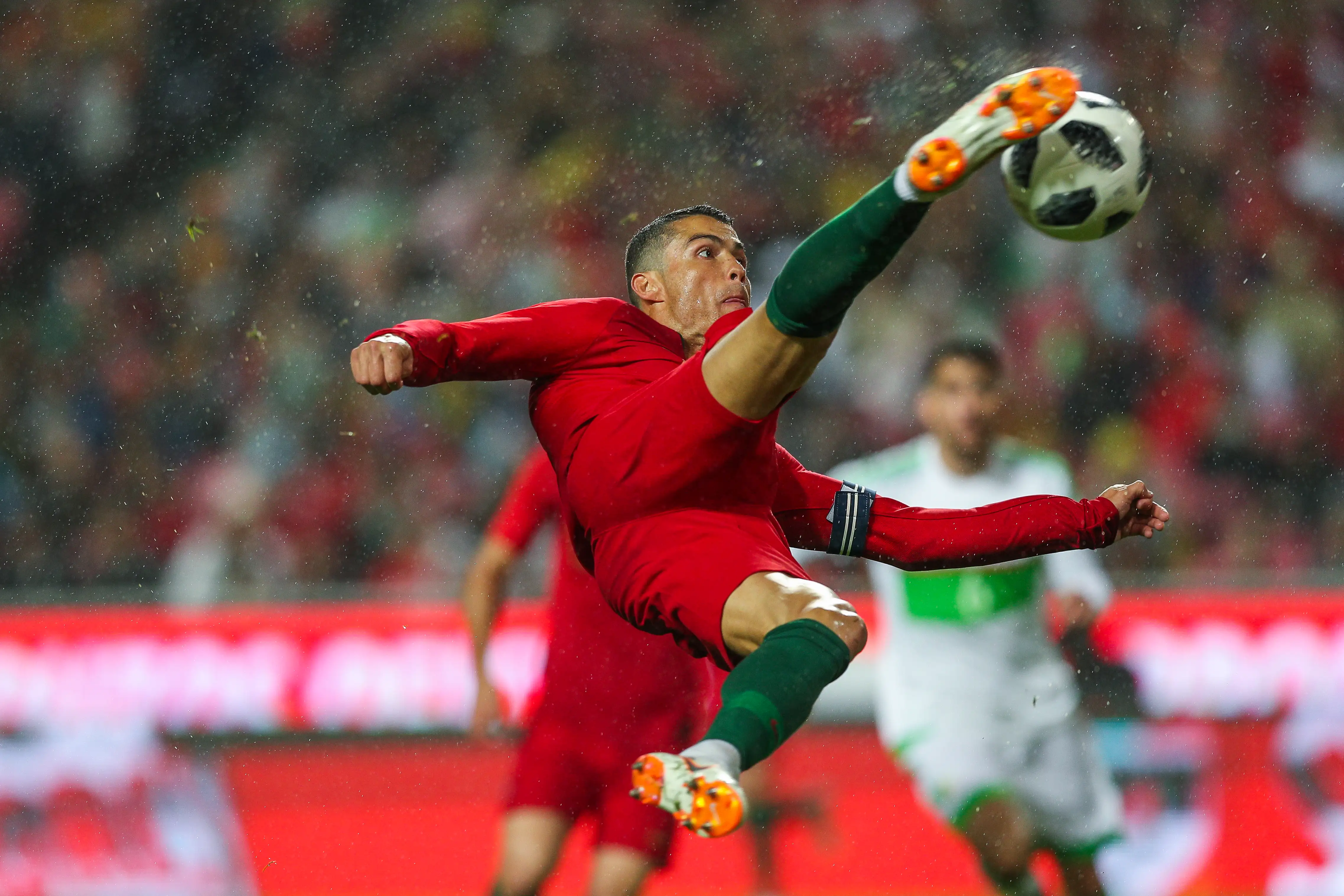 Cristiano Ronaldo kicking soccer ball