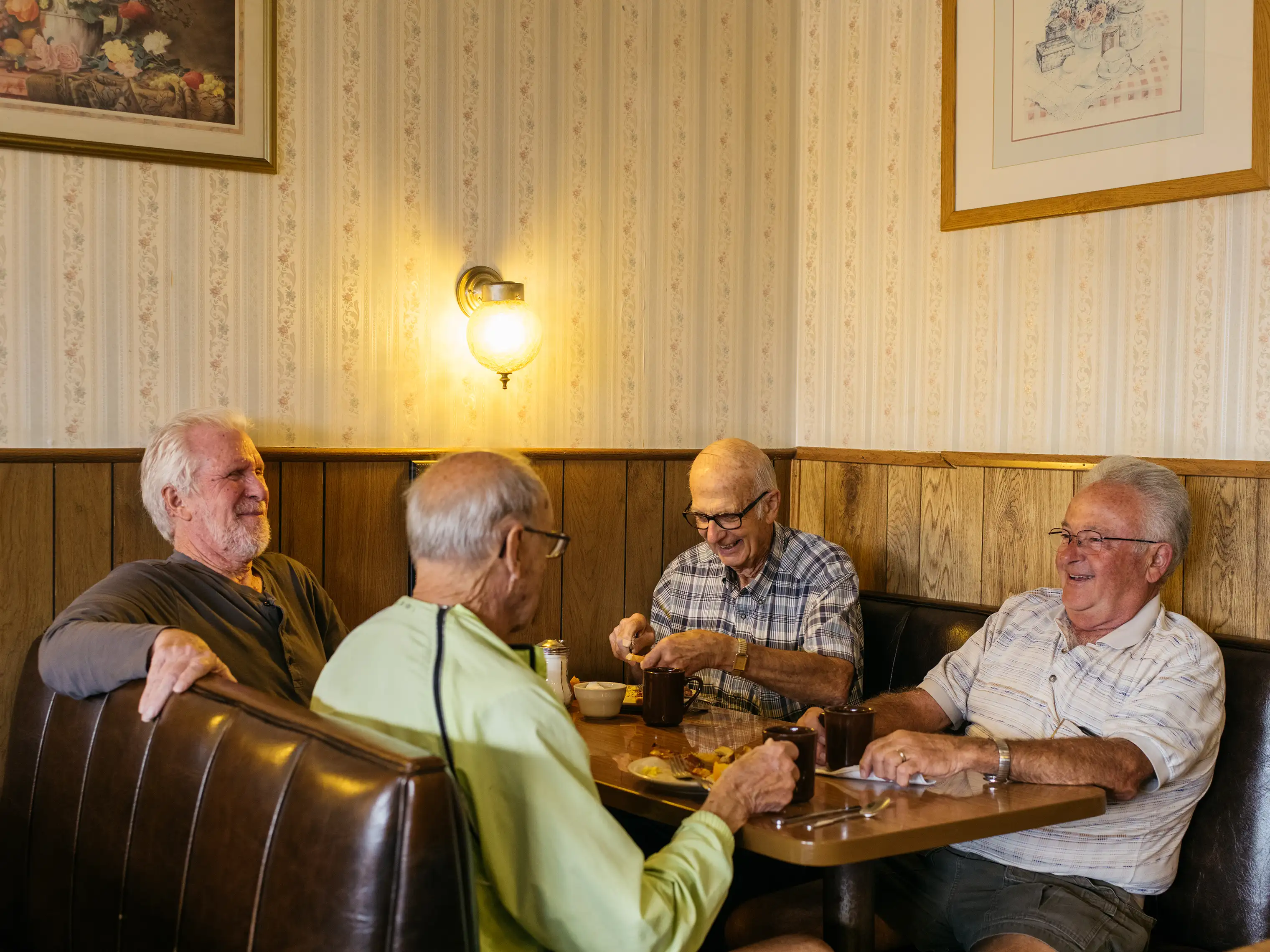 Wilbur Repp (third from left) having coffee with his daily breakfast group, Richard Ellsworth, Jack LeWarn and Ron Roberts, at Mary's Fine Foods in Kent, WA.