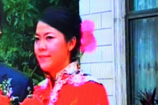 Video screen shot taken on October 23, 2008 shows Yang Huiyan, right, a major shareholder of Country Garden and Chinese Mainlands richest woman.