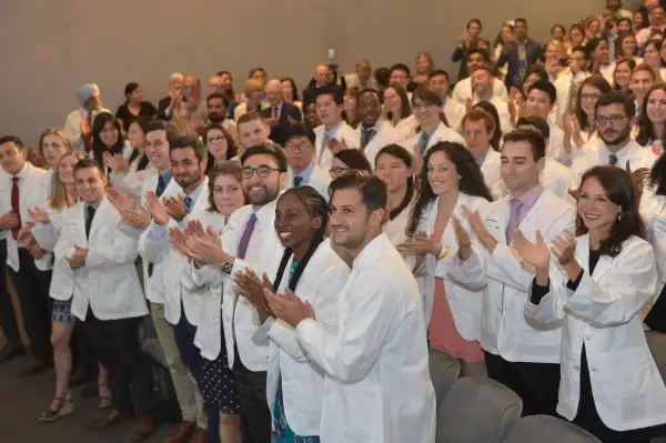 New York University's School of Medicine announced it would cover tuition fees for all current and future students at the annual White Coat Ceremony Thursday, August 16, 2018.