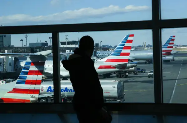 Planes sit on the tarmac at La Guardia Airport on January 25, 2019 in New York. - The Federal Aviation Administration has stopped flights into La Guardia Airport in New York due to major staff shortages amid the partial government shutdown. Airport delays are reported across the northeast due to air tragic controller shortage.