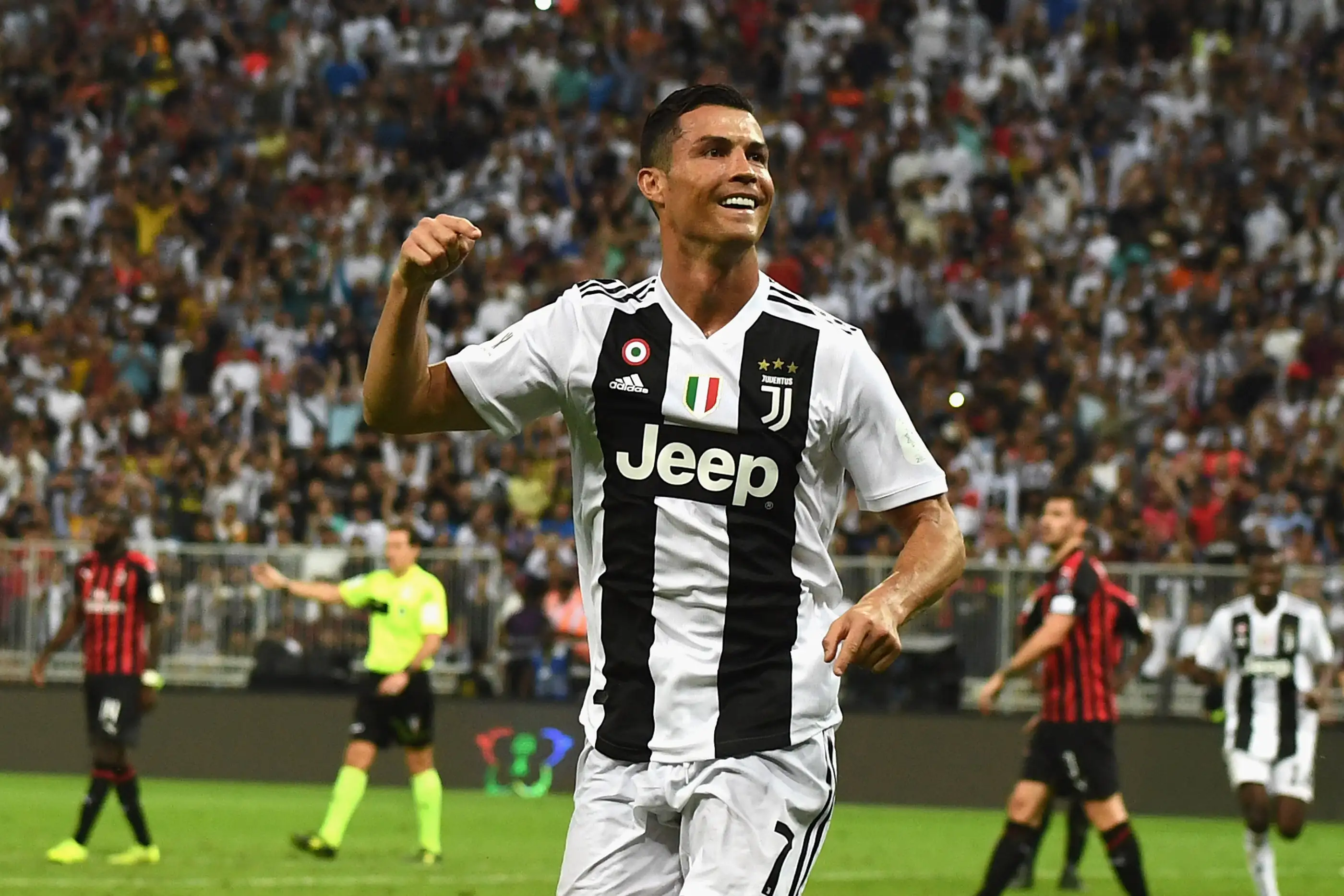 Cristiano Ronaldo of Juventus celebrates after scoring his sides first goal during the Italian Supercup match between Juventus and AC Milan at King Abdullah Sports City on January 16, 2019 in Jeddah, Saudi Arabia.