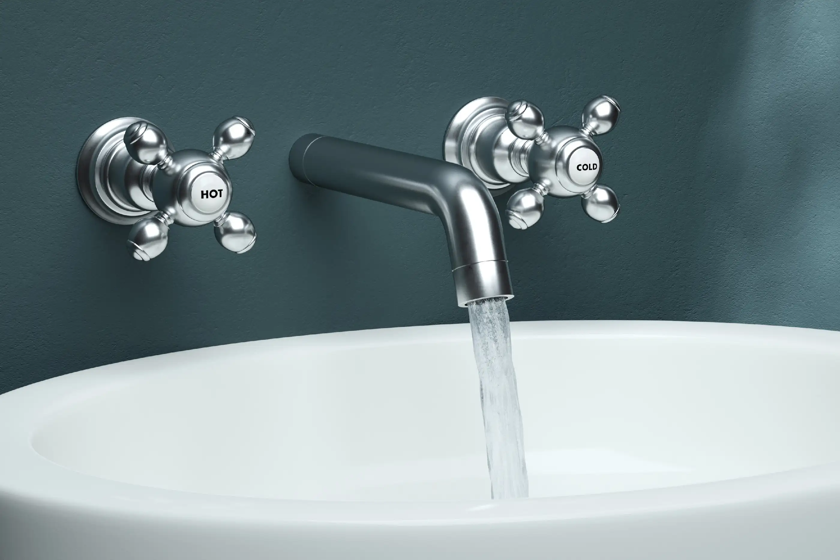 Close-Up Of Water Dripping From Faucet In Sink