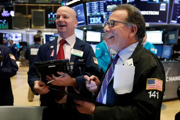 Traders Patrick Casey, left, and Sal Suarino work on the floor of the New York Stock Exchange, . Stocks are opening higher on Wall Street after Chinese and U.S. officials agreed to continue trade talks in Washington next week Financial Markets Wall Street, New York, February 14, 2019.