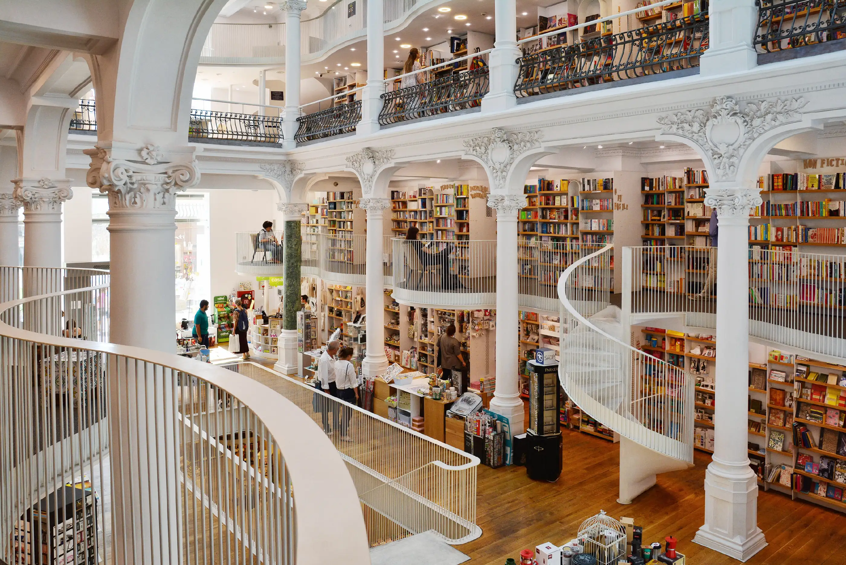 Carturesti Carusel Bookshop with modern white architecture in a refurbished historic building in Lipscani, Old town of Bucharest, Romania.