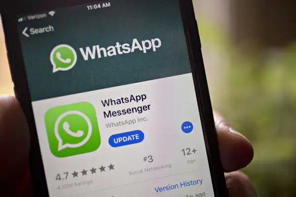 The Facebook Inc. WhatsApp application is displayed in the App Store on an Apple Inc. iPhone in an arranged photograph taken in Arlington, Virginia, U.S. on Monday, April 29, 2019. Facebook paid out a $123 million fine to EU antitrust regulators for failing to provide accurate information during their review of Facebook's WhatsApp takeover.