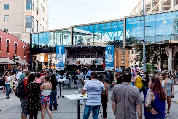 People attending an outdoor concert in downtown Rochester, Minnesota