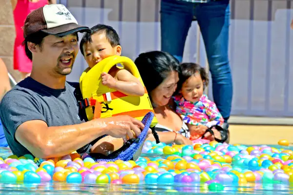 Family playing in a pool in Spring Valley, Nevada