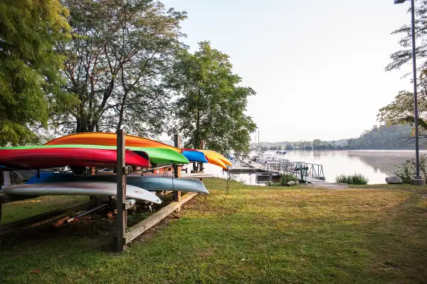 Kayaks stored by a lake in Eagle Creek, Indianapolis, Indiana