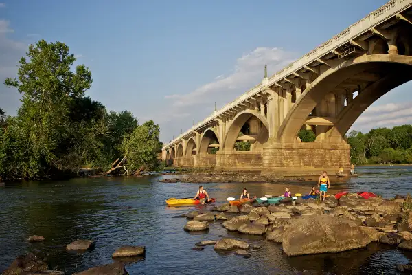 Kayakers under a bridge in Columbia, South Carolina