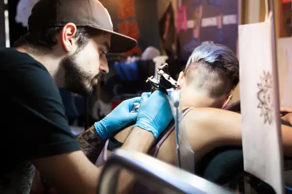 Tattoo artist at work