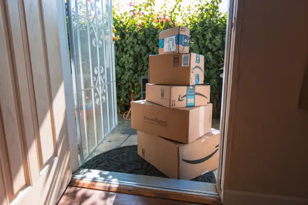 Cardboard package delivery at front door