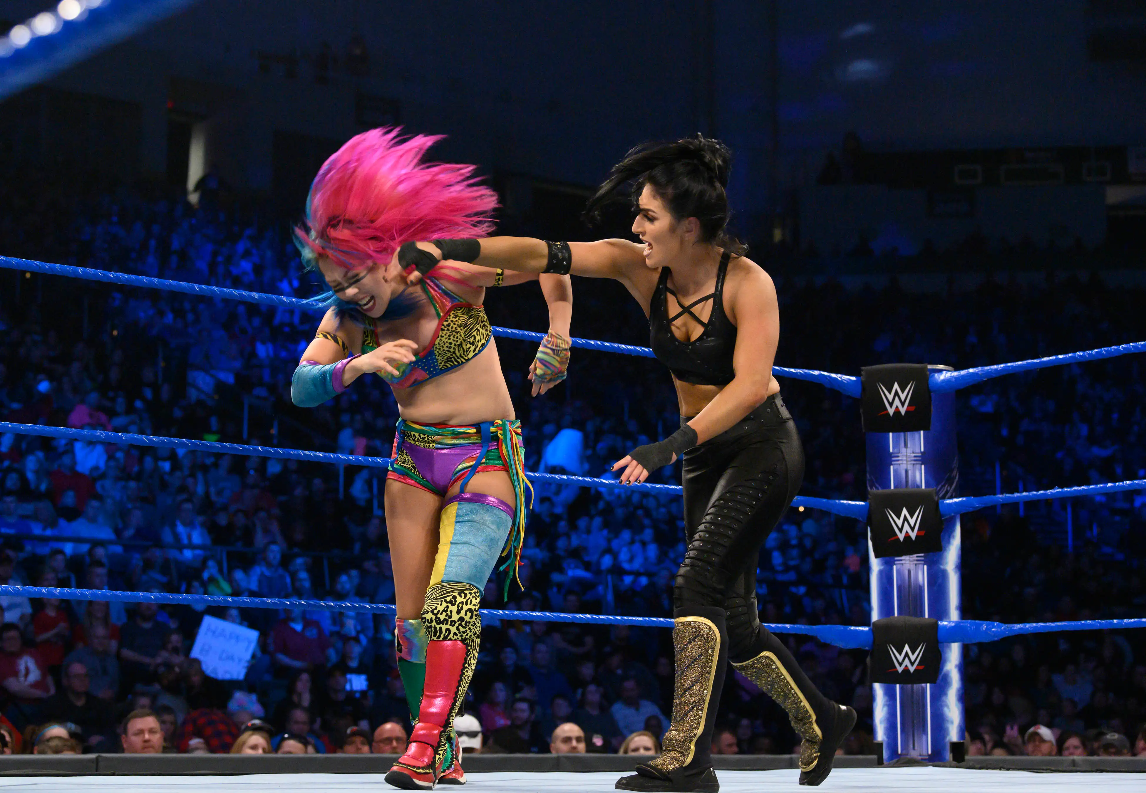 Daria Berenato (right) AKA  Sonya Deville  battles  Asuka  at a WWE SmackDown event in March 2019