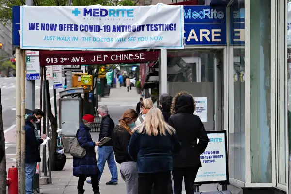 People line up outside MedRite Urgent Care.