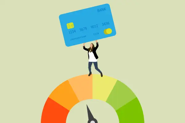 A woman lifting a credit card standing on top of the credit score wheel.