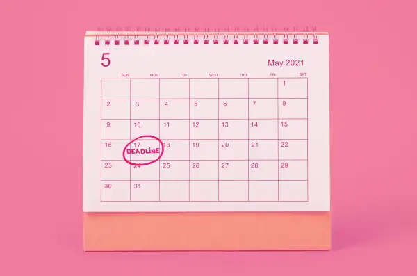 Calendar on a colored background with the deadline date May 17 circled in red