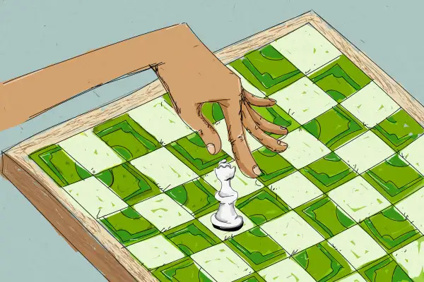 Hand Moving Chess Piece Across Board With Squares Made of Dollar Bills
