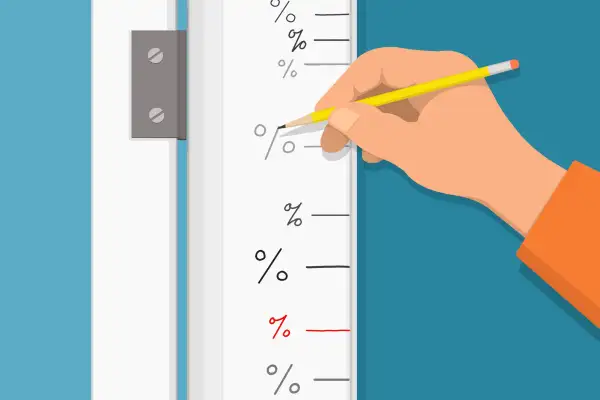 The inside of a doorframe that has different markings (like when parents mark the growth of their kids), but this one is for each time they refinanced.