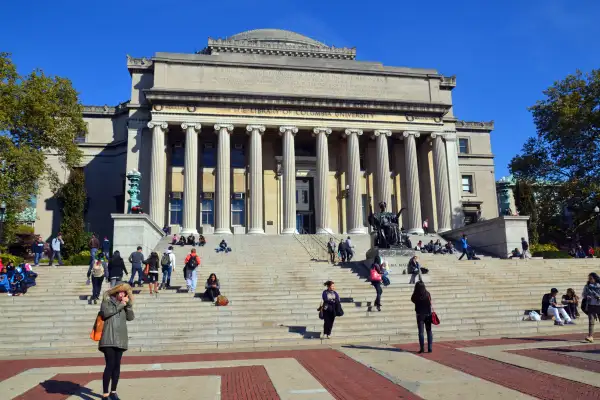Photograph of students on the steps of the Columbia University Library