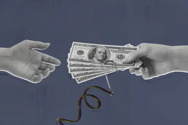 Open Hand Receiving Cash That Has A Fish Hook Attached To The Bottom