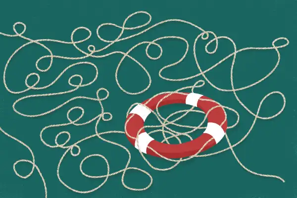 A life preserver ring with a long rope tangled around.