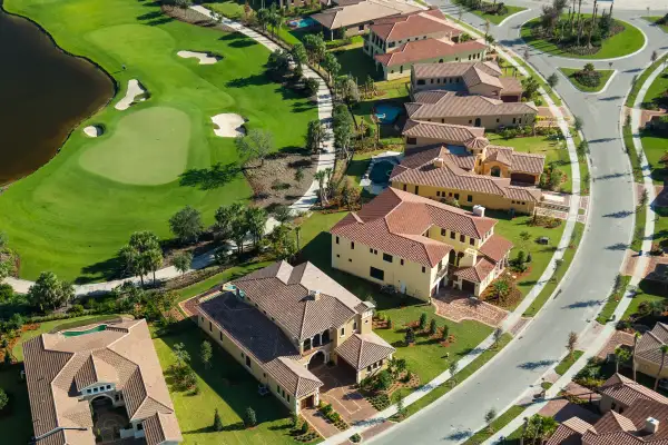 Aerial view of a row of lovely houses in a Florida golf community