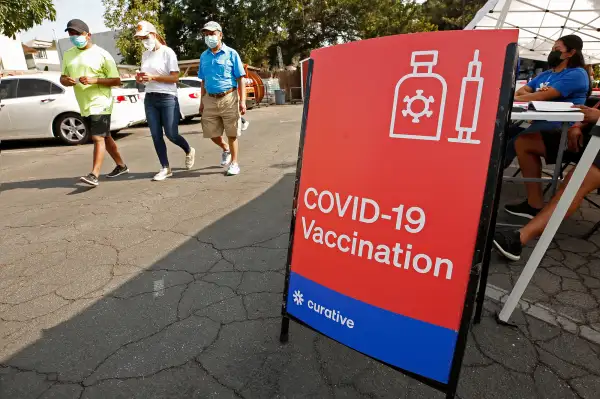 People waiting at a Covid-19 vaccination site