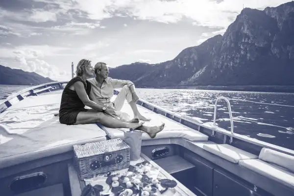 Senior couple enjoy time together on yacht