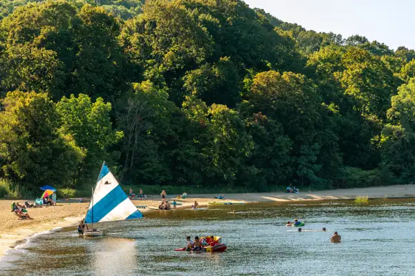 People enjoy the water at a beach in Plainview New York