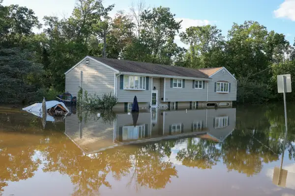 A view of a house surrounded by floodwater in New Jersey after Hurricane Ida