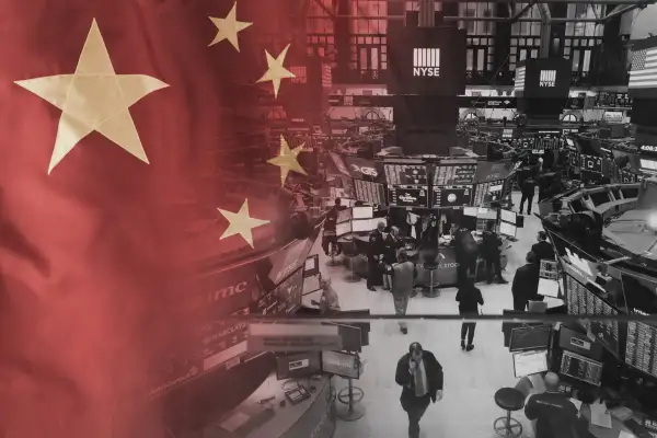The Chinese flag mixed with a photo of traders working at the New York Stock Exchange
