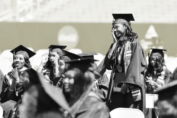 College graduates at commencement ceremony