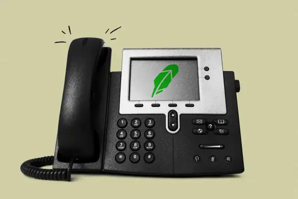 Office phone ringing with Robinhood logo on the digital screen