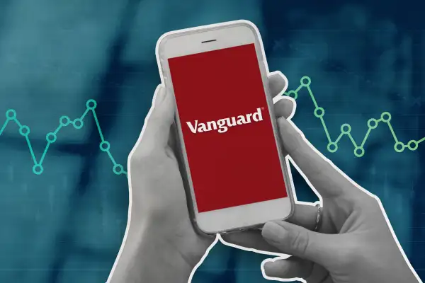 Hand Holding A Phone With The Vanguard Logo On The Screen