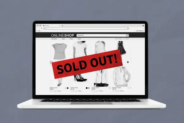 Laptop showing an online store with a  Sold out  sign