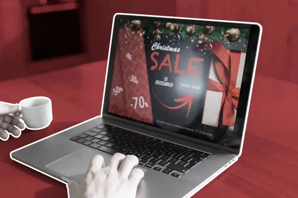 Laptop With Christmas Sale On Screen